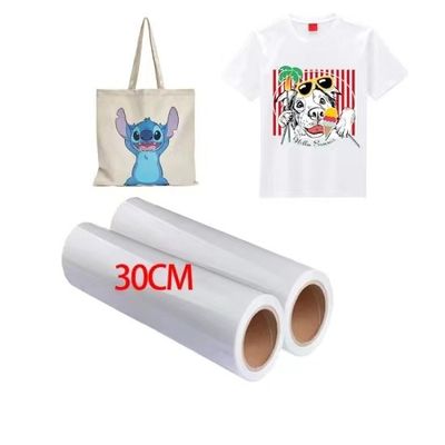 DTF Baskı Malzemeleri ile Baskı Potansiyelinizi Maksimumlaştırın 30cm*100m 75U Serbestleştirme Evcil hayvan filmi ruloları Çift taraflı soğuk kabuk